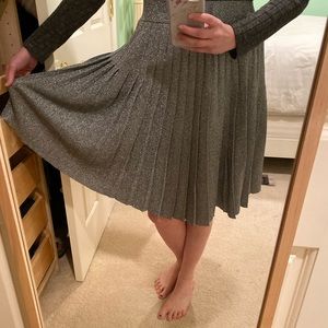 Silver sparkly pleated knee length skirt